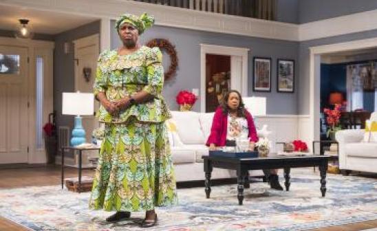 Actors on the set of Familiar play